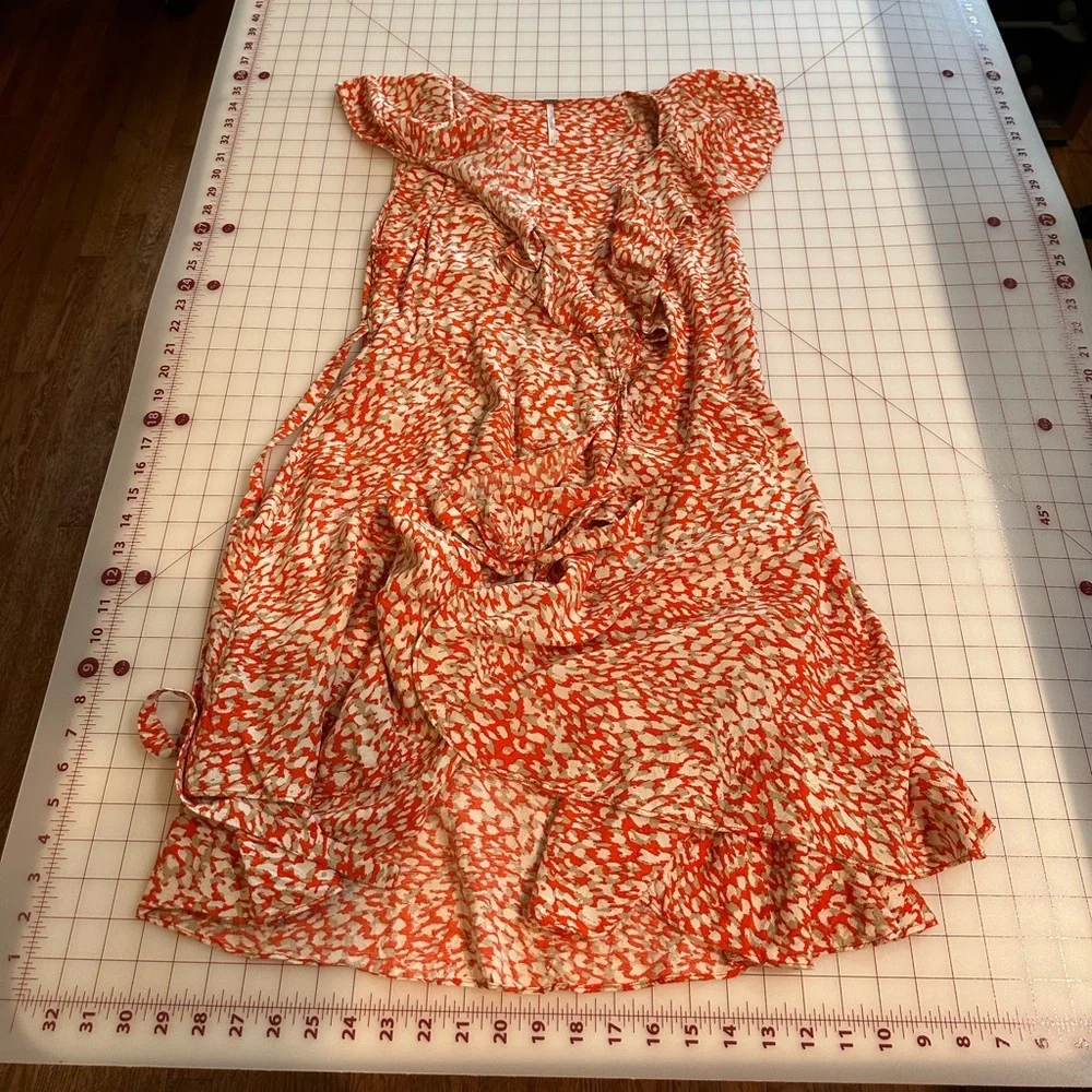 Free People size small white orange and tan animal print cute summer wrap dress